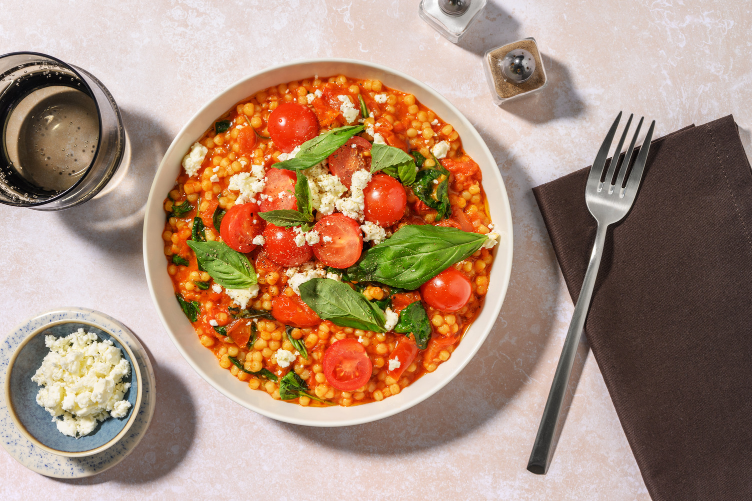 Risotto de couscous perlé & duo de tomates