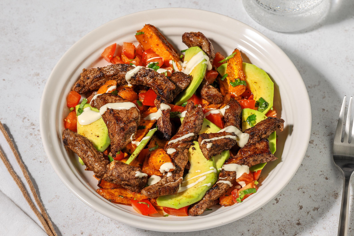 Émincés de steak à la mexicaine et bowl de patate douce rôtie