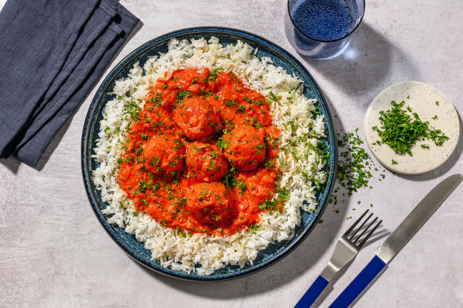 Albóndigas con extra de merluza en salsa de tomate
