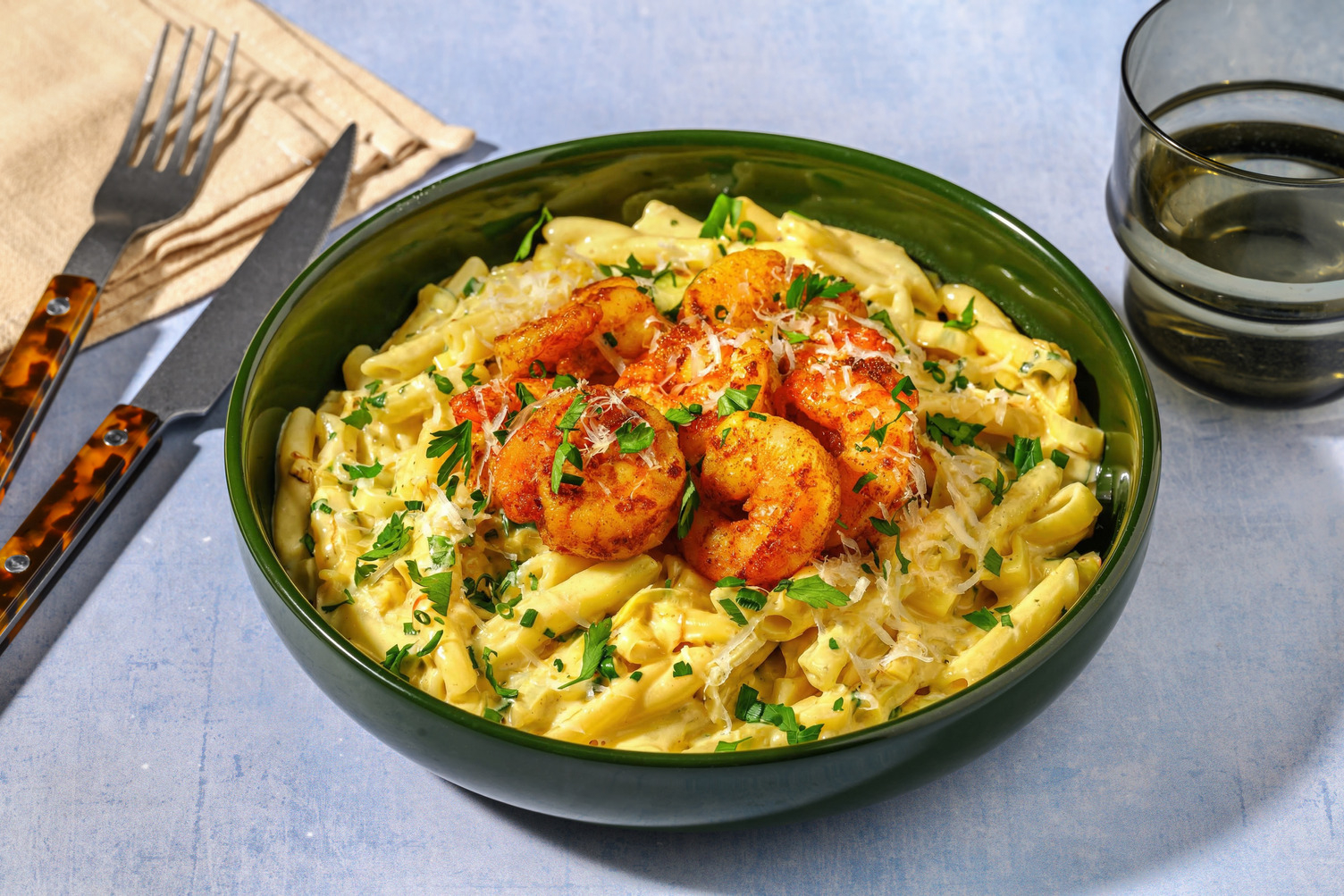 Currygarnalen met casarecce en beurre blanc