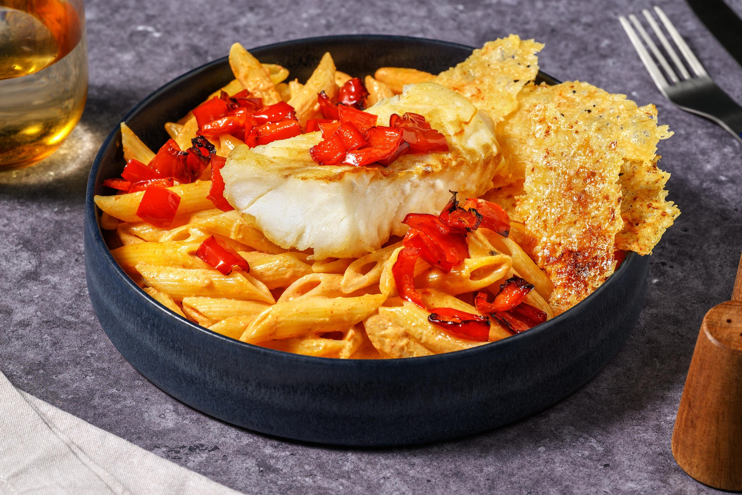 Penne mit Tilapia und Peperoni