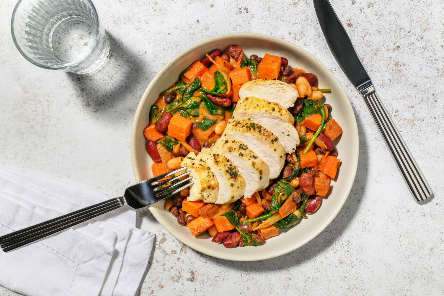 Herby Chicken Breast on Creamy Cajun Stew