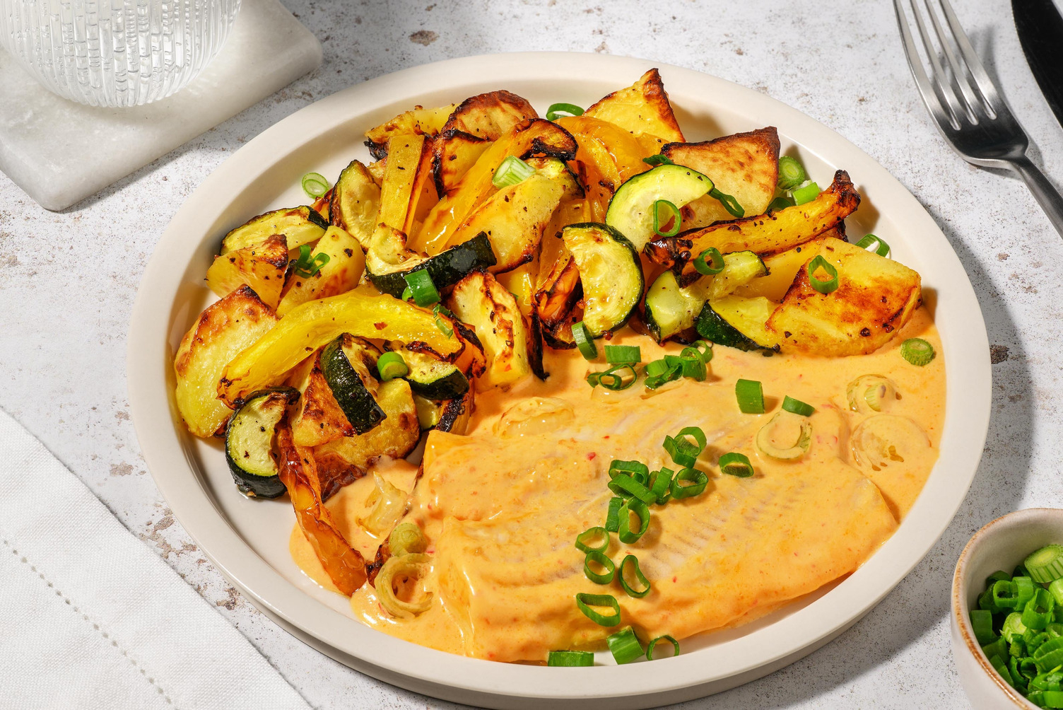 Pochierter Seelachs in Tomatenrahm