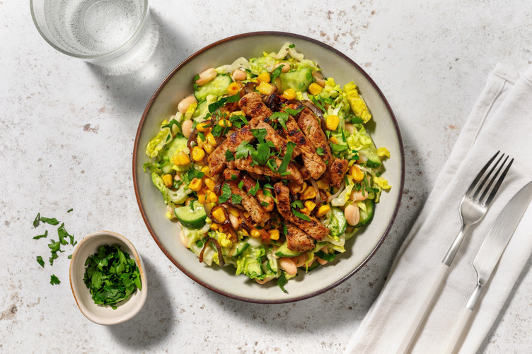 Cajun Bio-Schweinestreifen auf Cannellini-Salat
