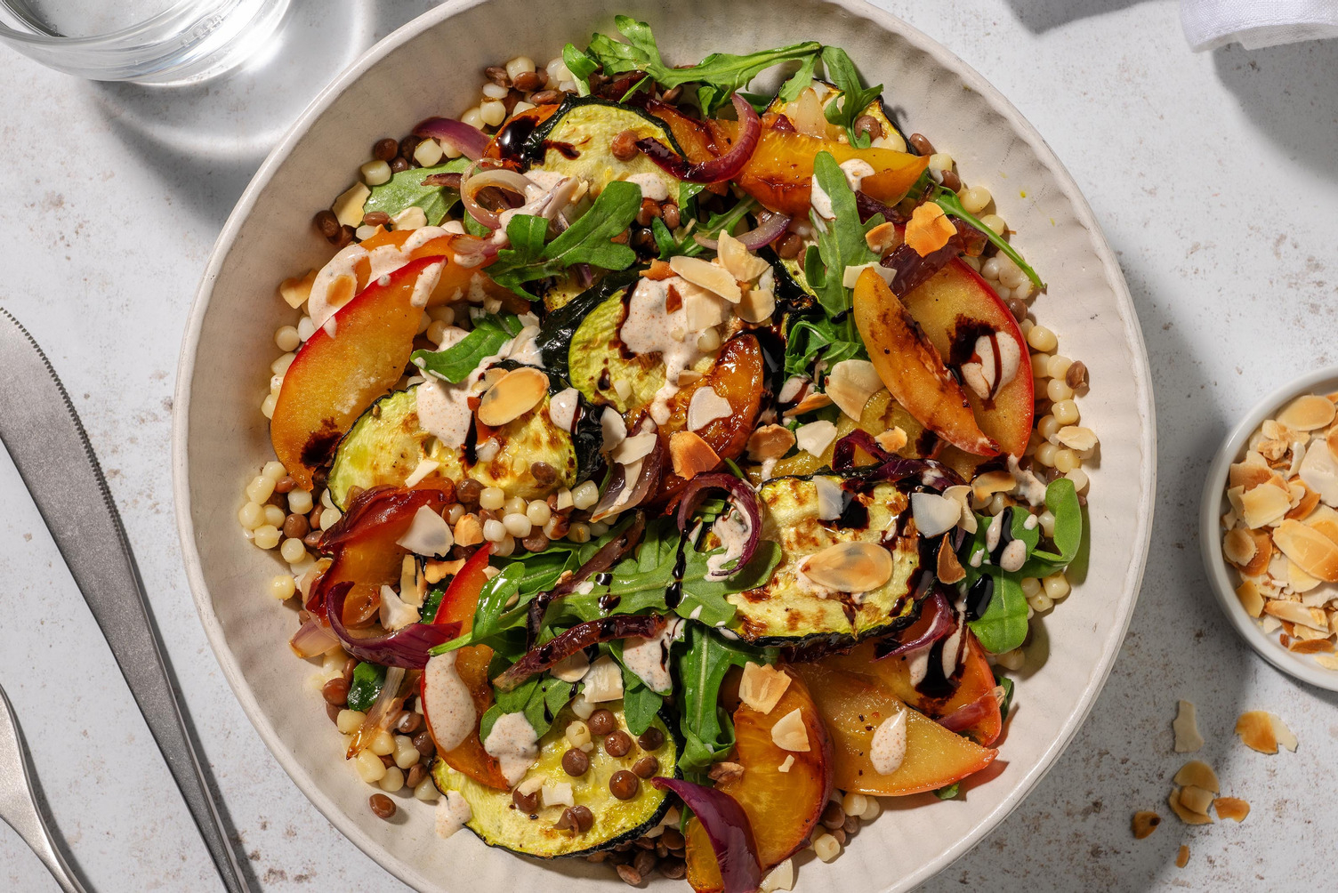 Couscous perlé à la pêche et sauce crémeuse au fromage grec