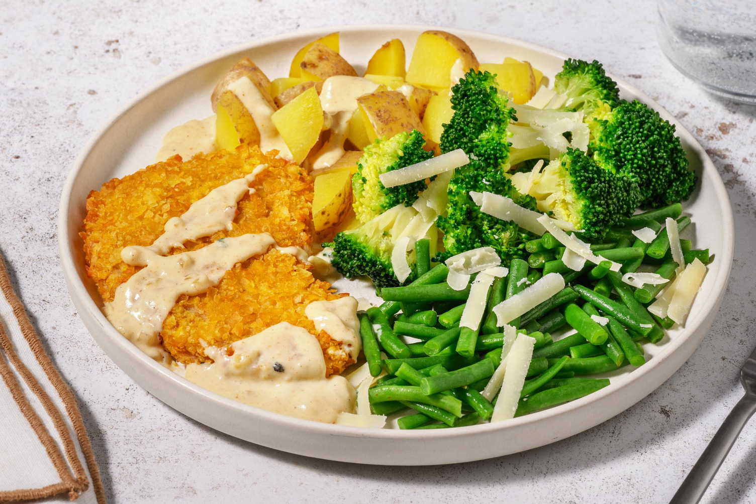 Vegetarische schnitzel met Parmigiano-roomsaus