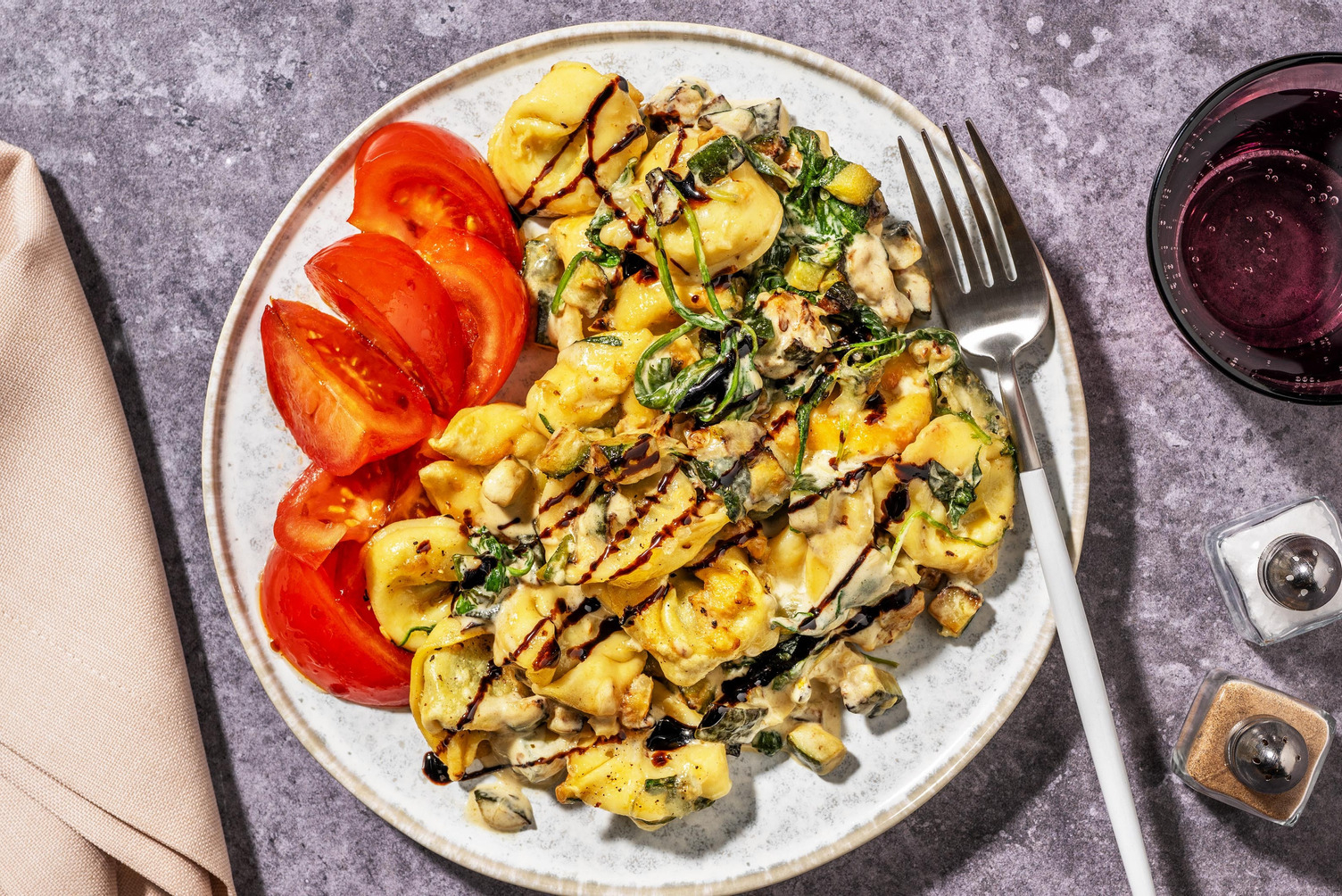 Gratin crémeux de tortelloni aux champignons