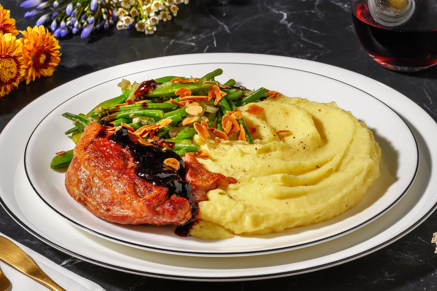 Duck Confit with Blueberry Sauce & Buttered Almonds