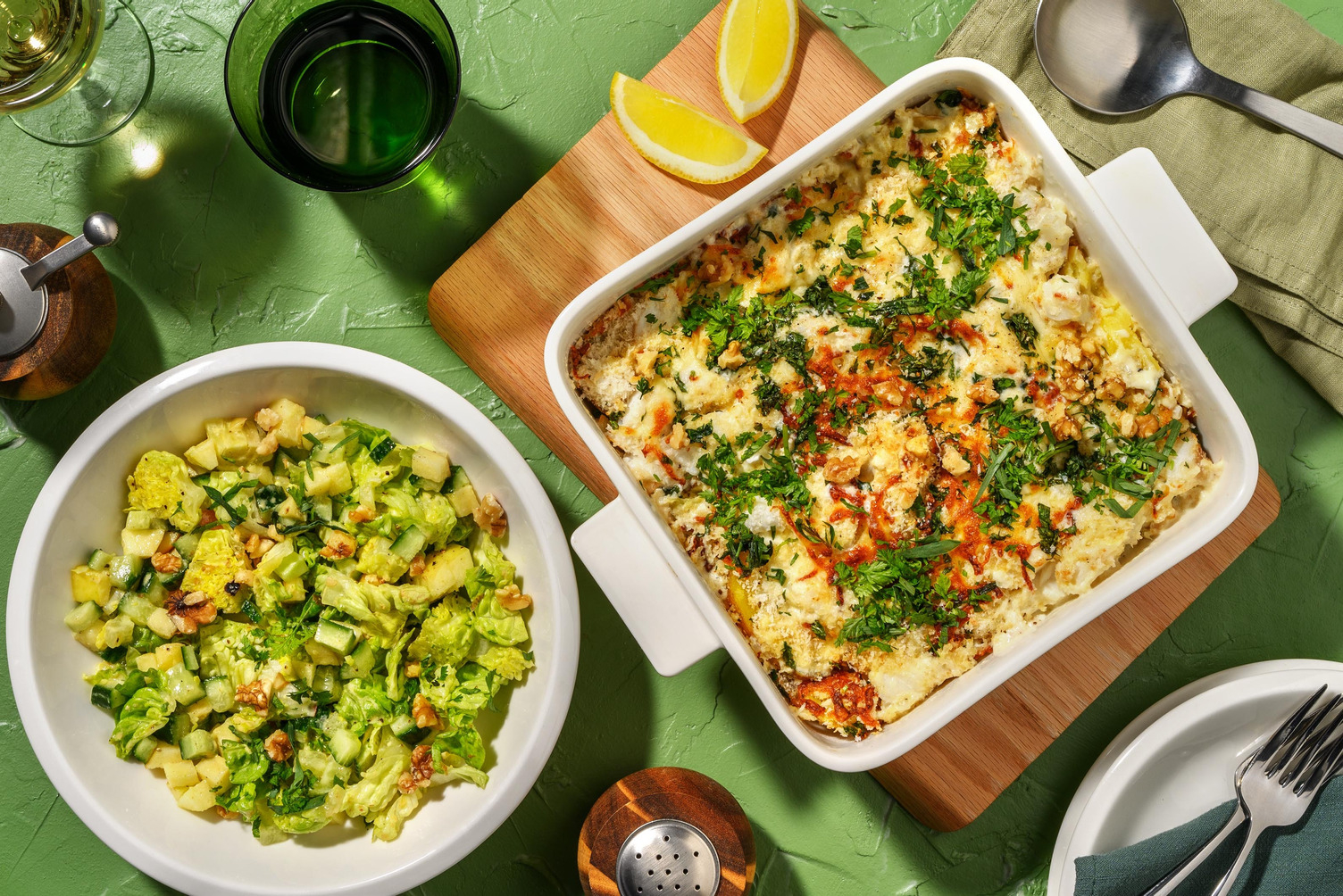 Gegratineerde kabeljauw met hollandaisesaus en verse kruiden