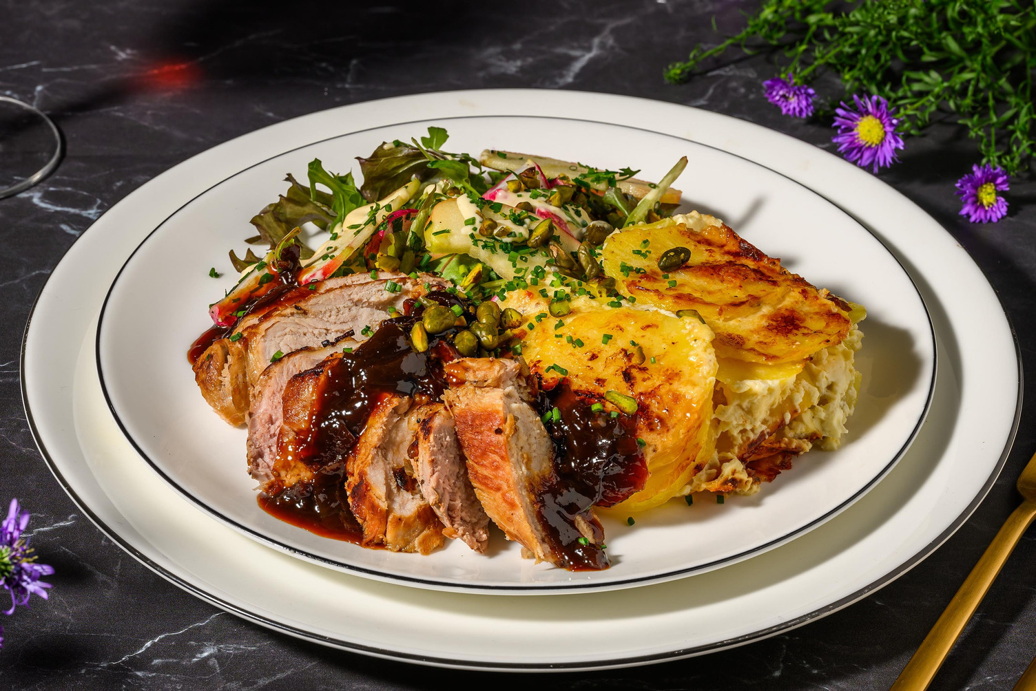 Varkenshaas met kalfsjus en aardappelgratin