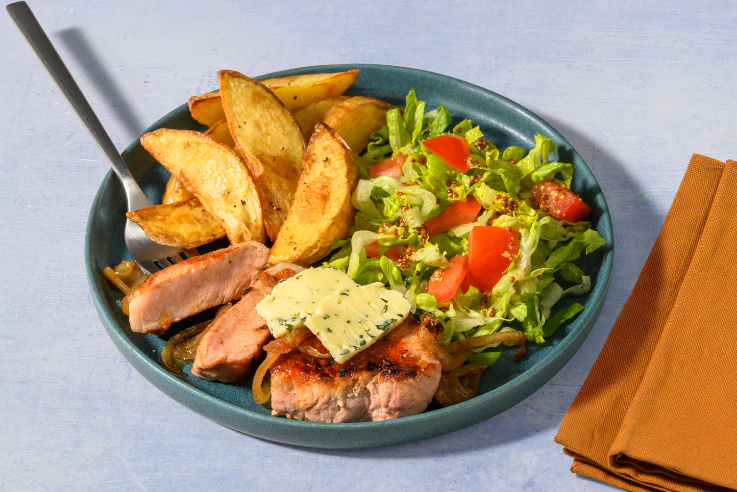 Doppelt Schweinelachssteak mit Estragonbutter