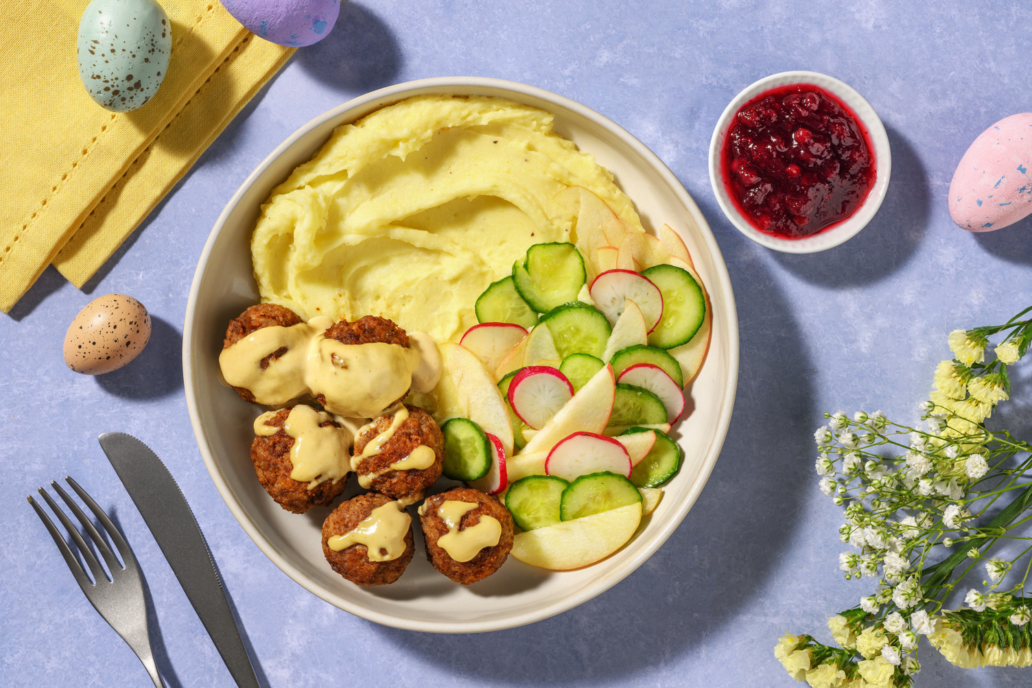 Fläskfärsköttbullar i krämig gräddsås