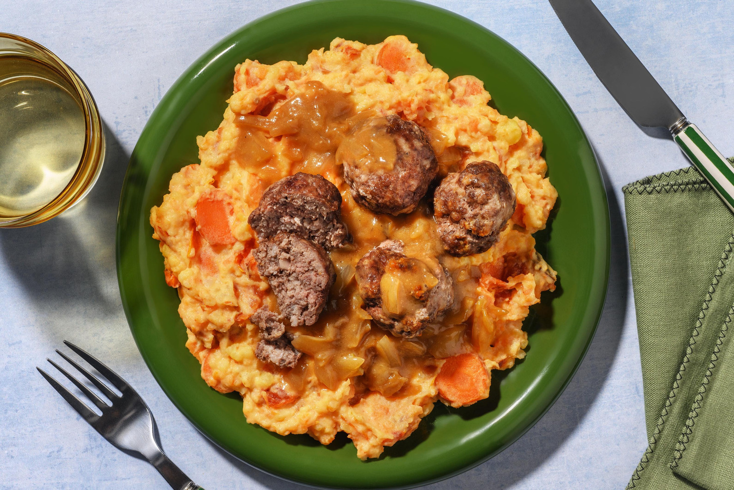 Stoemp, boulettes de viande et tomates séchées
