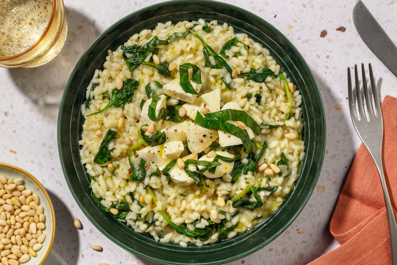 Risotto cremoso allo stracchino e basilico