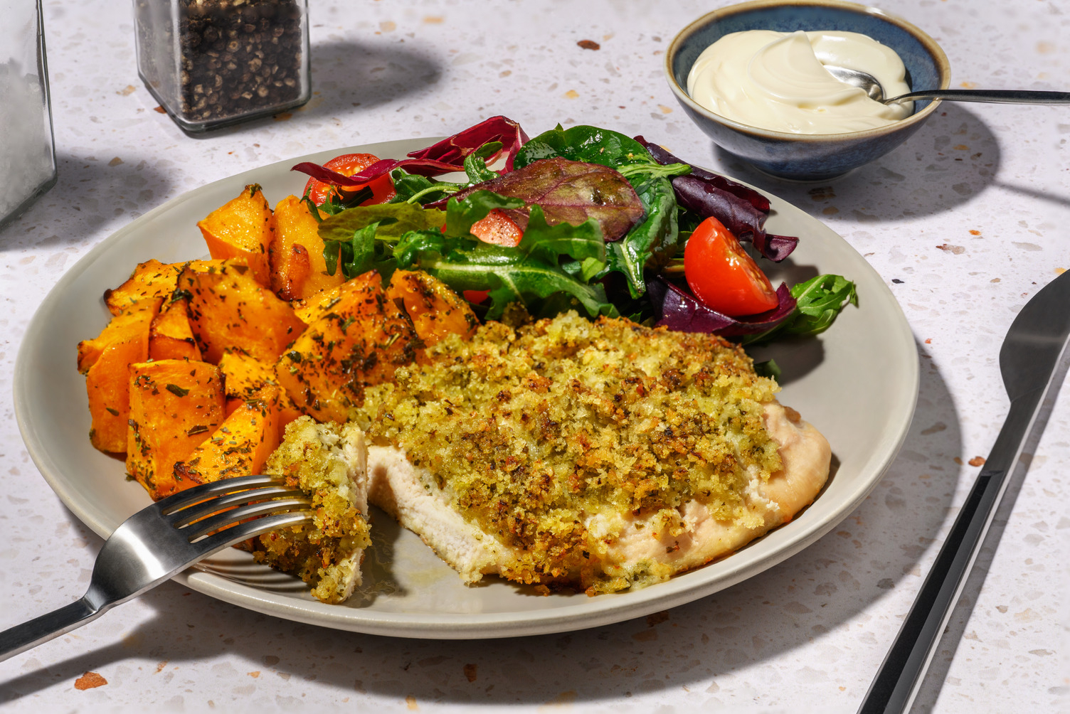Crumbed Pesto Hasselback Chicken & Haloumi