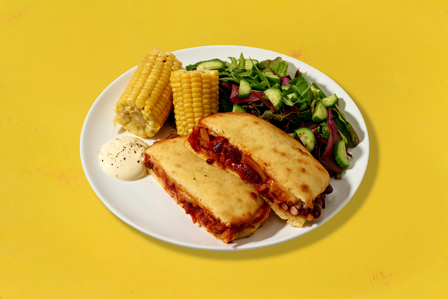 Shortcut Two-Cheese Mexican Bean & Pork Pitas