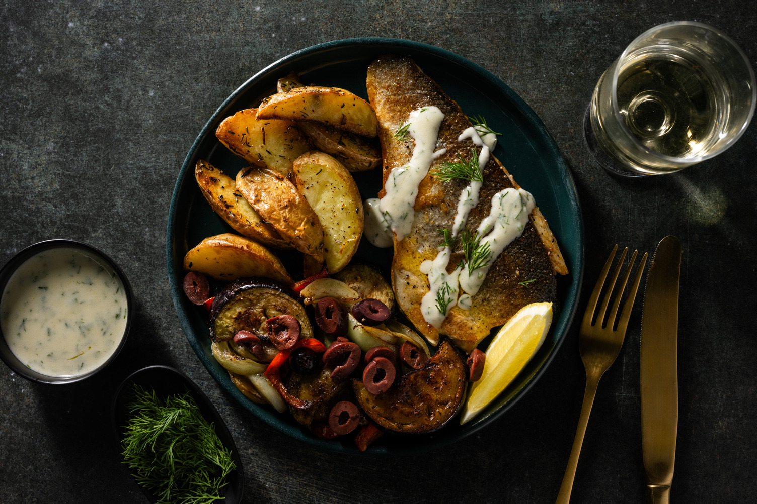 Heekfilet in romige dillesaus met citroenaardappelen