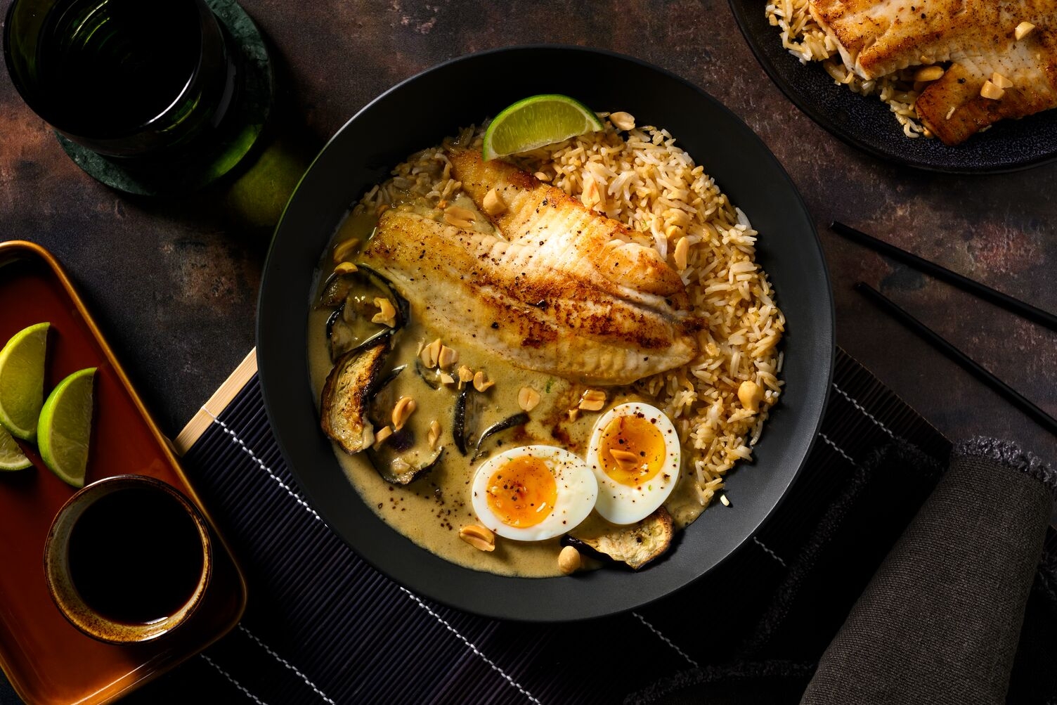 Zeewolf met groene curry en zachtgekookt ei