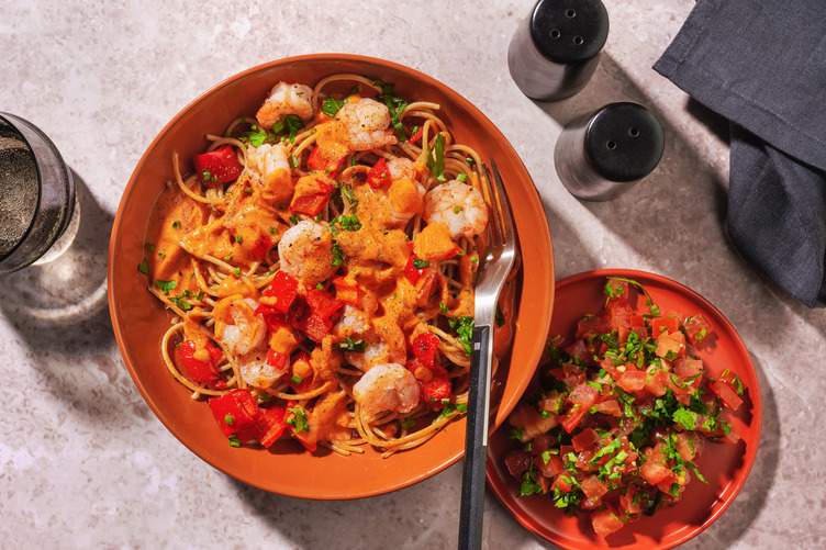 Spaghetti met scampi's in romige currysaus