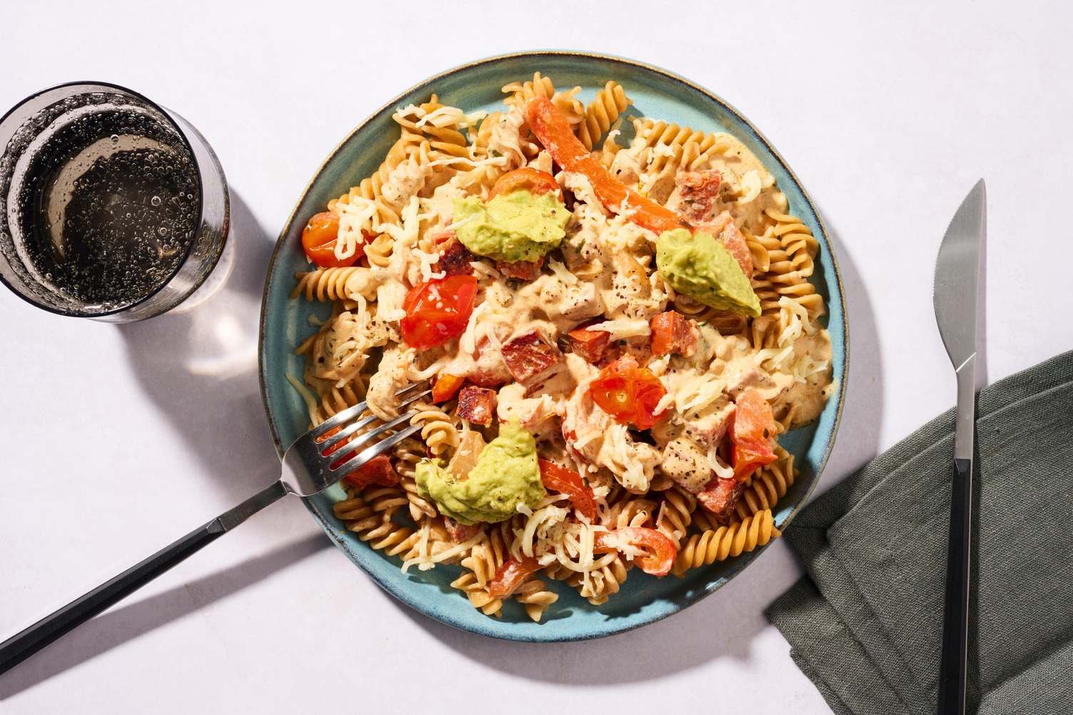 Volkoren fusilli in romige chorizosaus