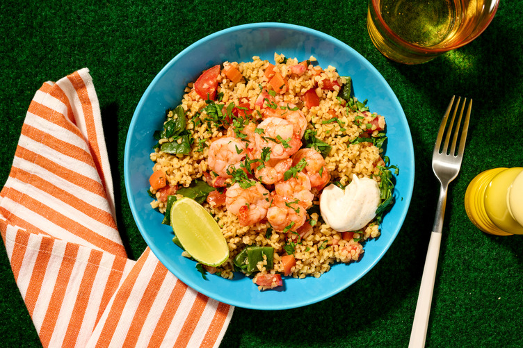 Bulgurbowl met scampi's en yoghurtsaus