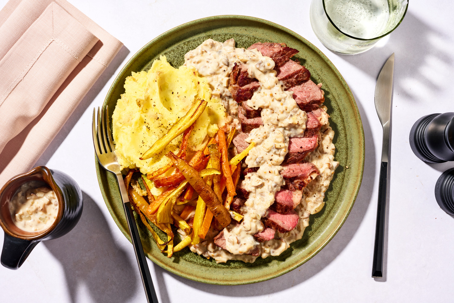 Steak de cerf en sauce crémeuse au portobello
