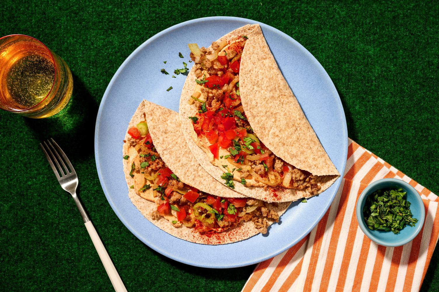 Volkoren wraps met varkensvlees en verse kruiden