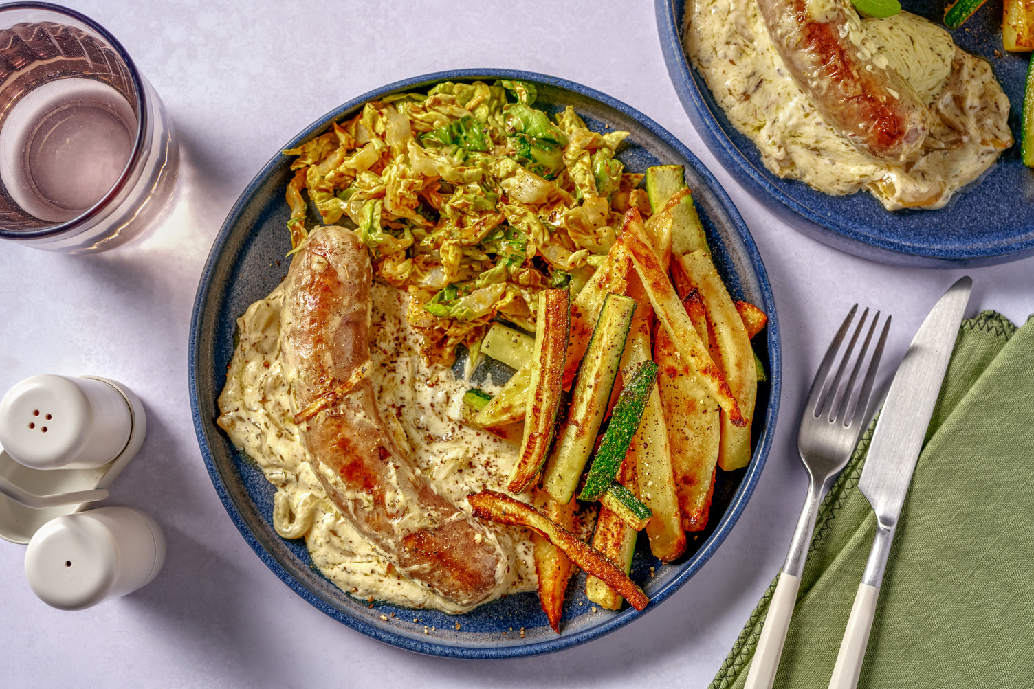 Saucisse de Toulouse sauce au thym & oignon