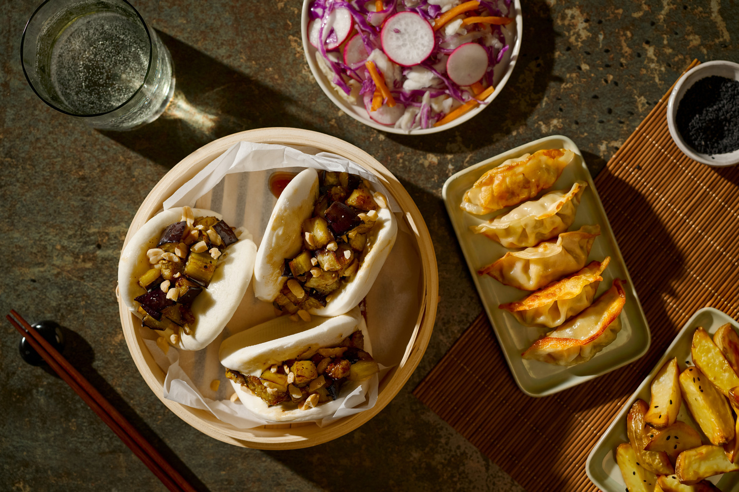Veggie Gyozas, Miso-Honey Aubergine Bao and Sesame Radish Slaw