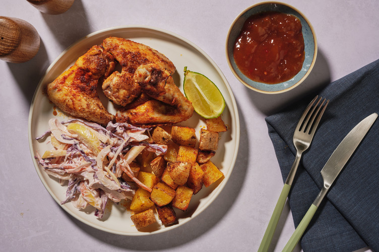 Caribische stijl kippenvleugels met zoete mangodip
