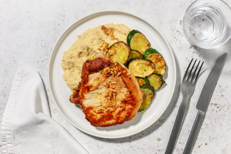 Extra de chuleta de cerdo con puré de coliflor caramelizada