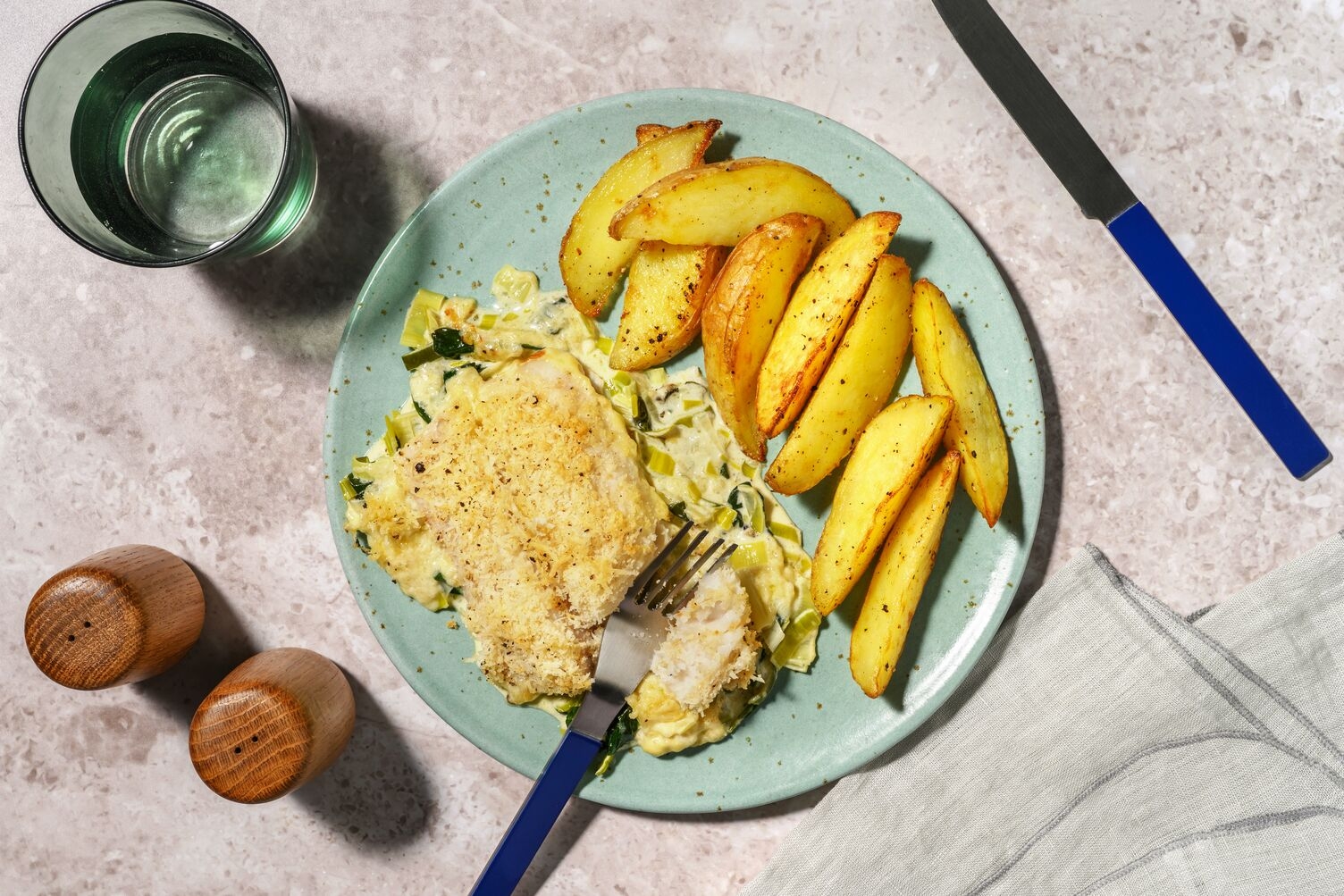 Buntbarsch aus dem Ofen in Spinat-Lauch-Sauce