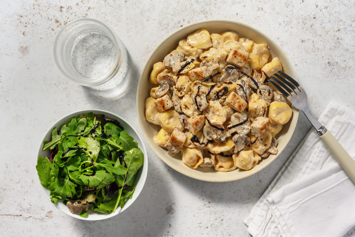 Chicken and Ham Tortelloni in Creamy Mushroom Sauce
