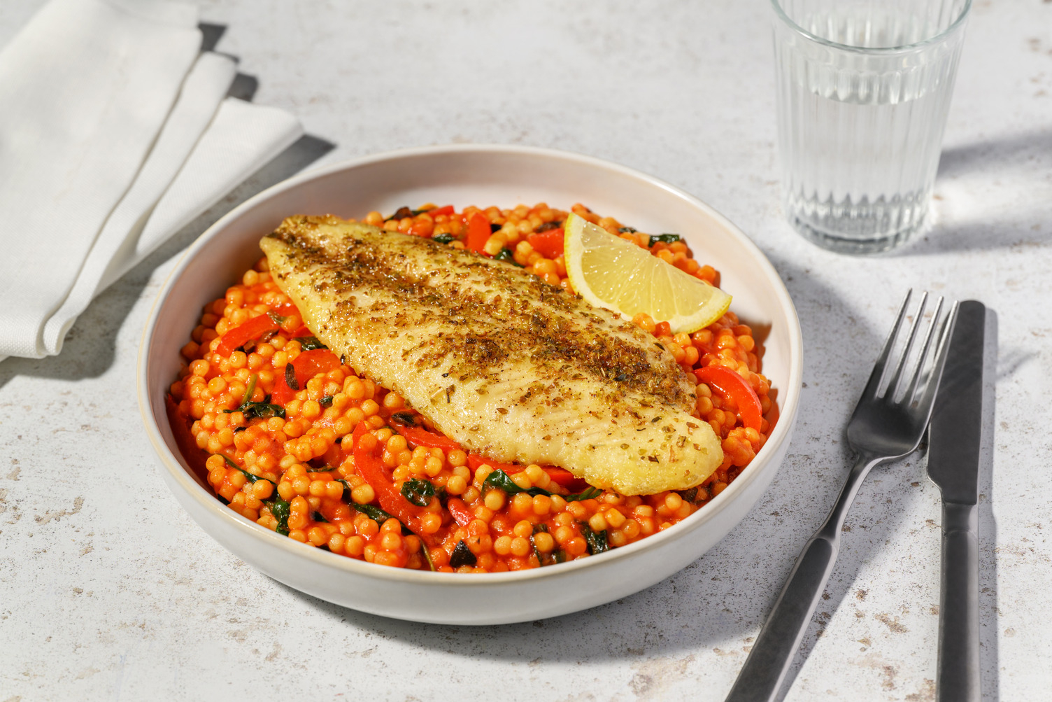 Quick Greek Inspired Basa and Paprika Pearl Couscous