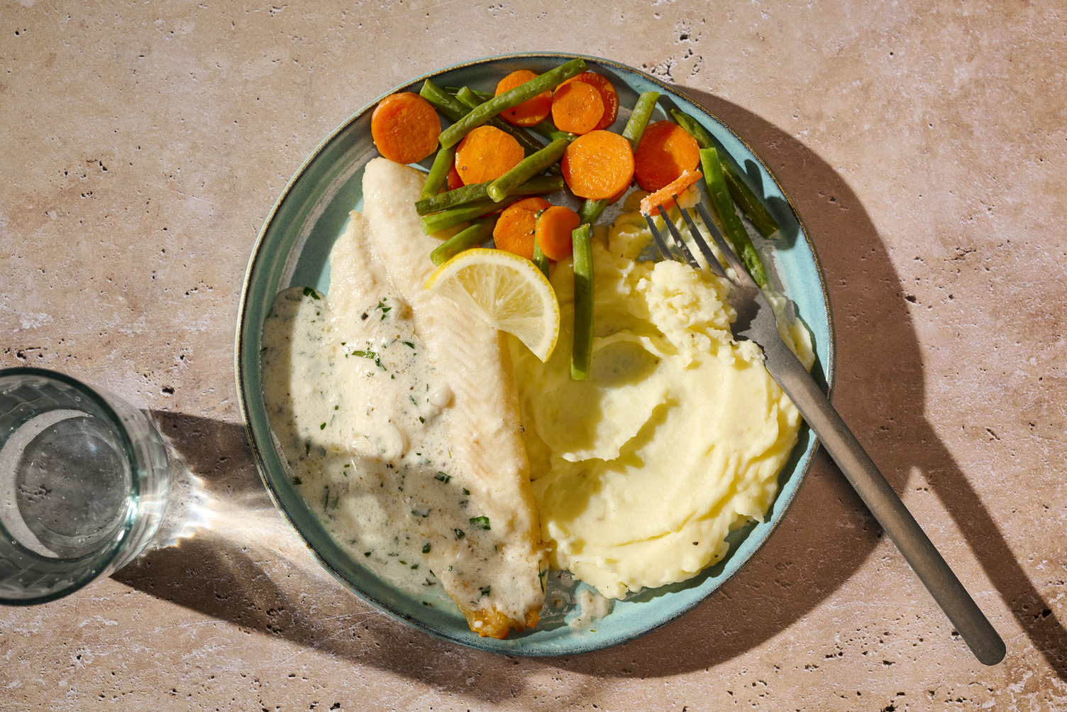 Doppelt Pangasius in Estragon-Senf-Soße