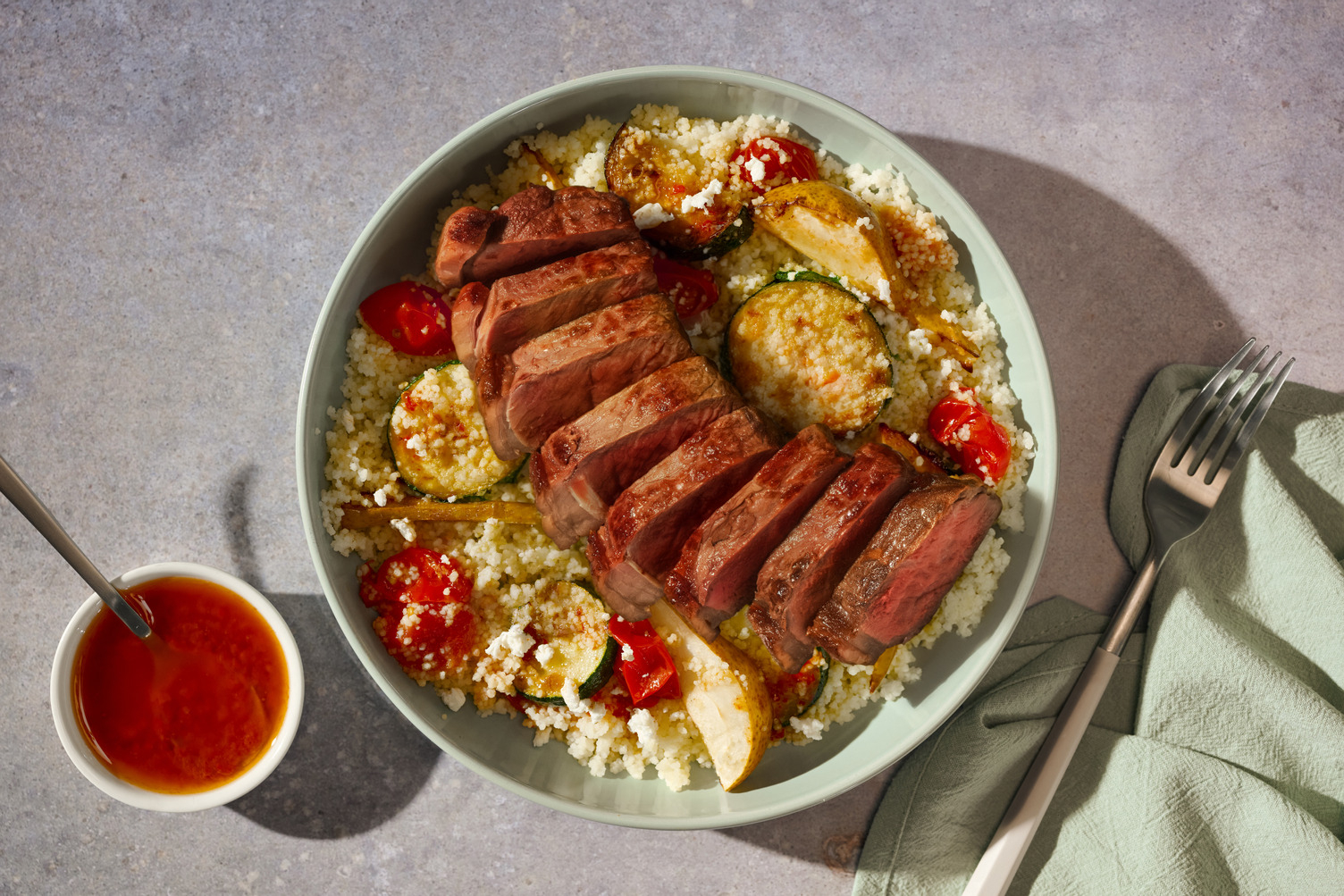 Chermoula Rump Steaks and Pear-Tomato Traybake