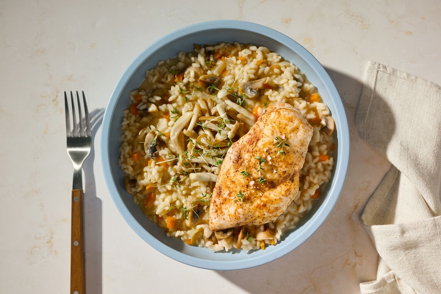 Risotto mit Shimeji Pilzen, Guanciale & Bio-Huhn