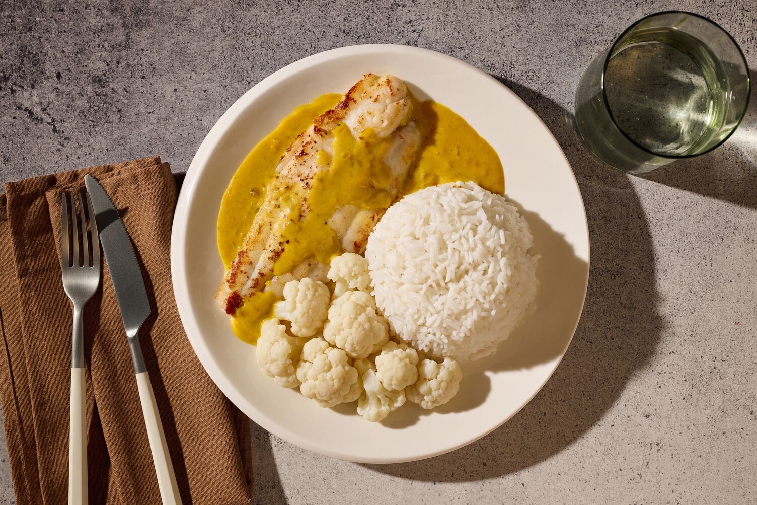 Doppelt Fischfilet in Mango-Sahne-Soße