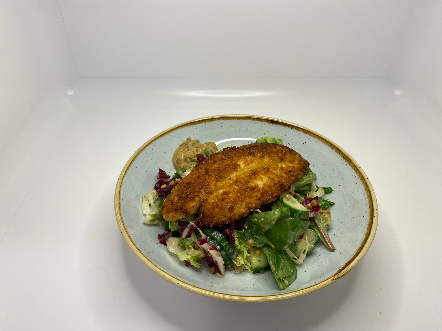 Knuspriger Pangasius mit Senfsoße