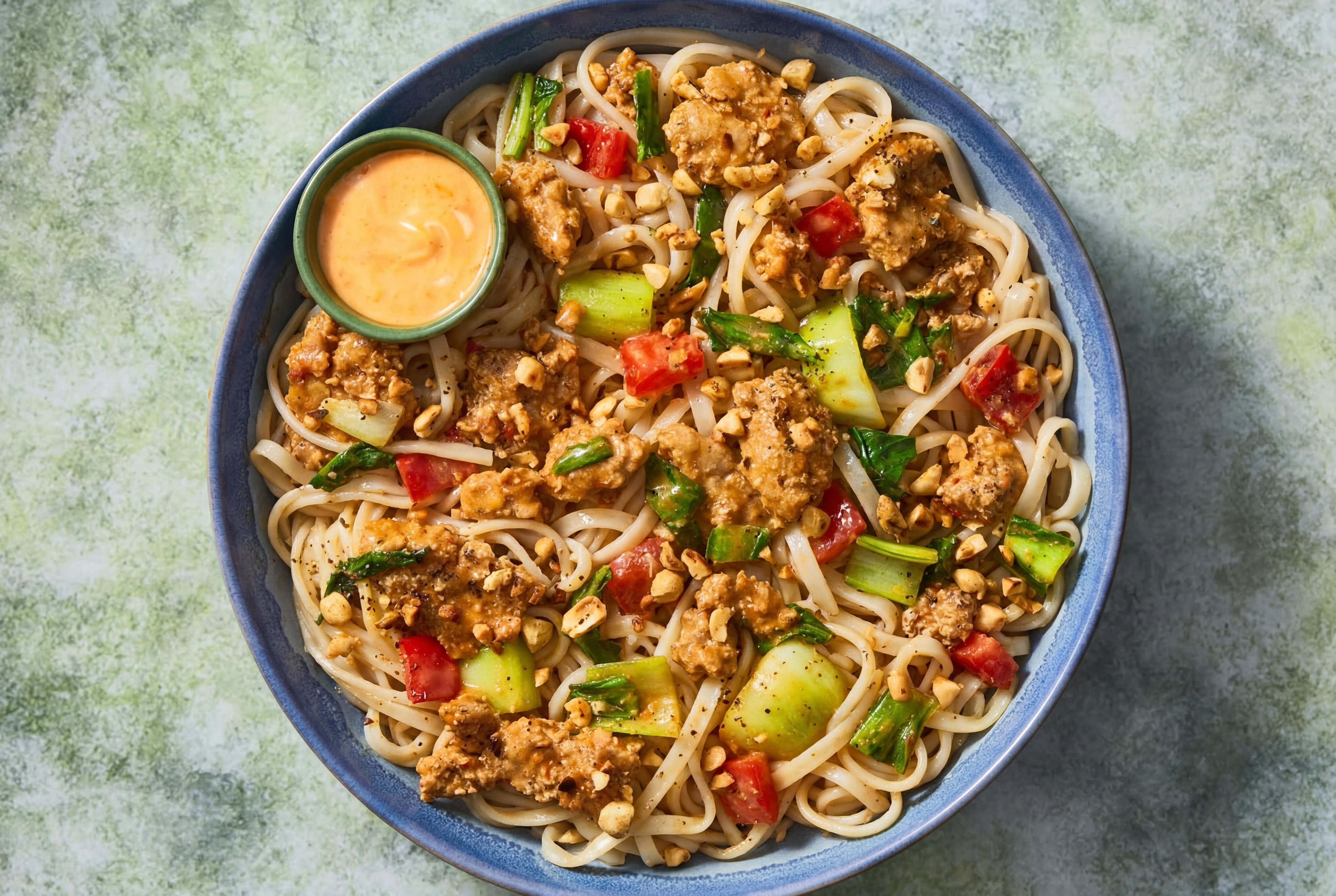Spicy Impossible® Burger Patties and Peanut Dragon Noodles