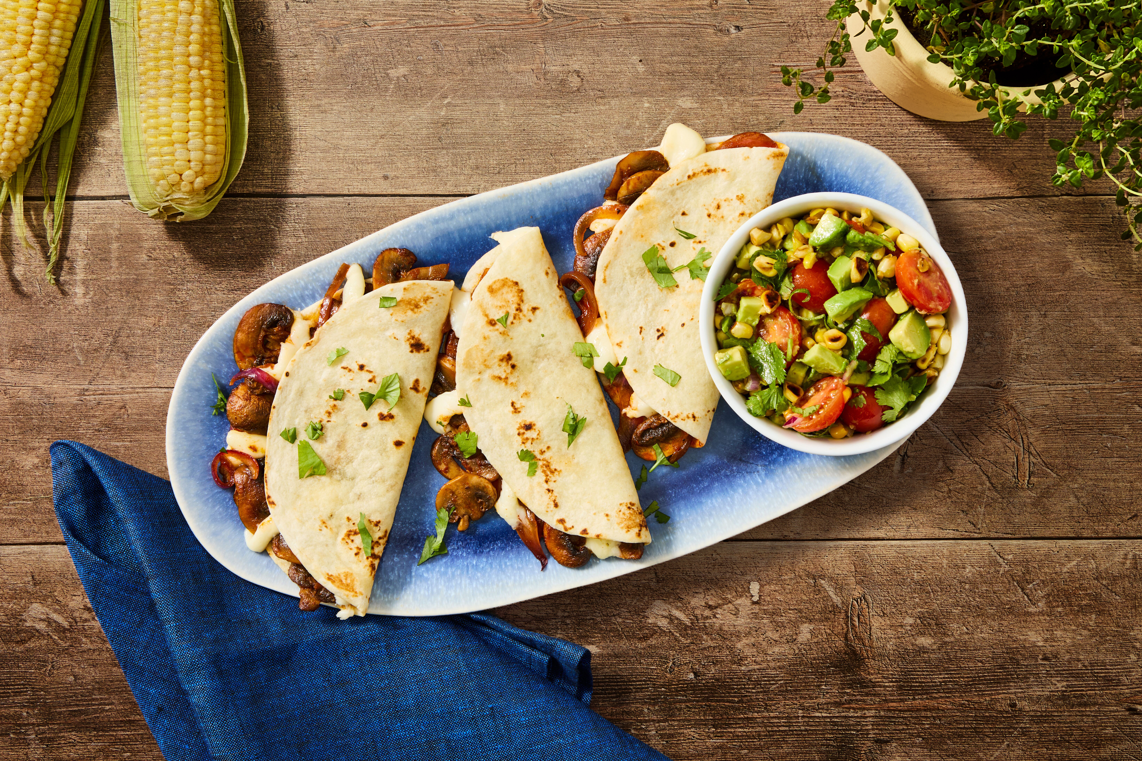 Mozzarella-Mushroom Quesadillas with Tomato-Elotes Salad