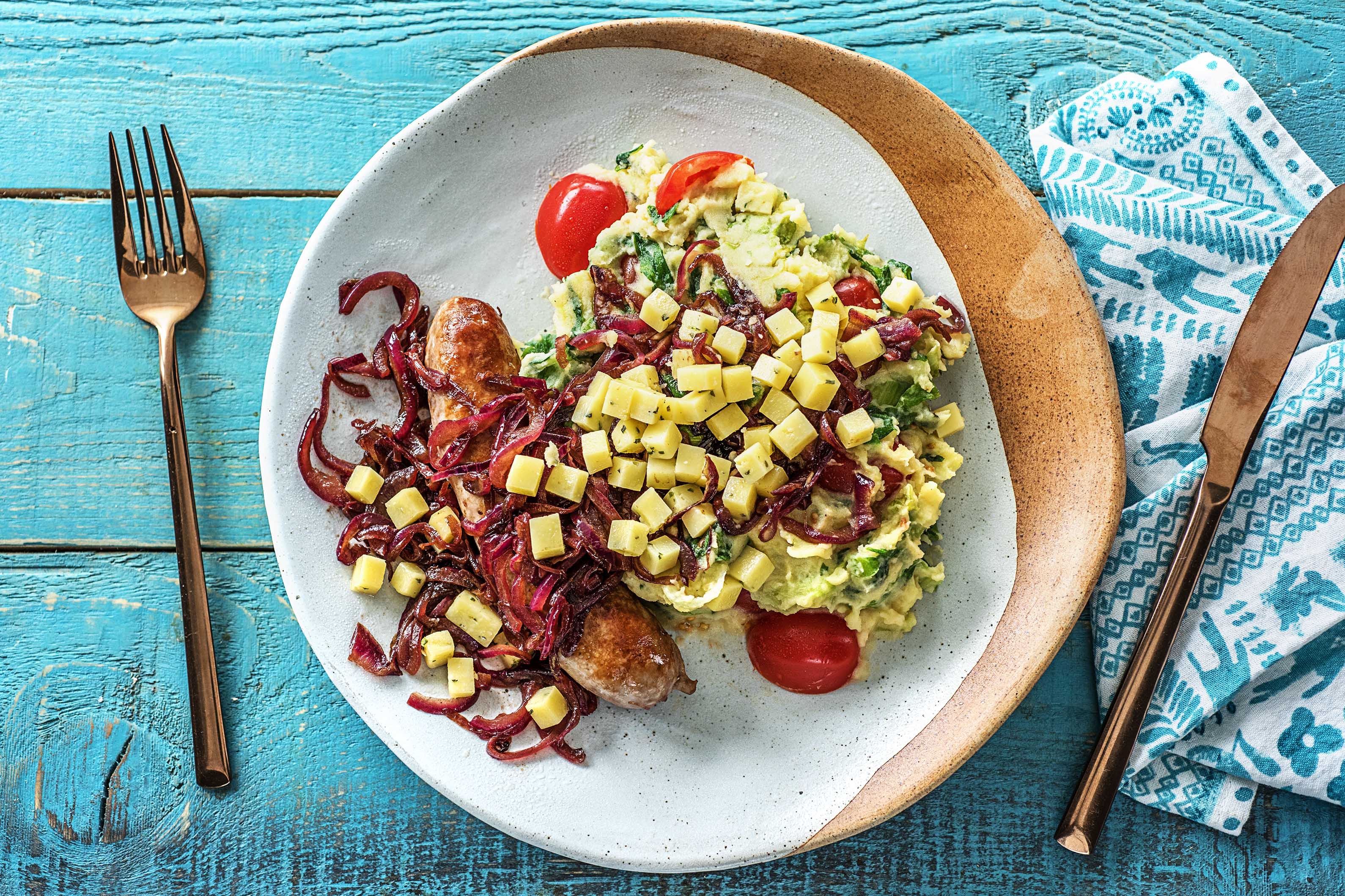 Purée de chicorée et saucisse à l'ail