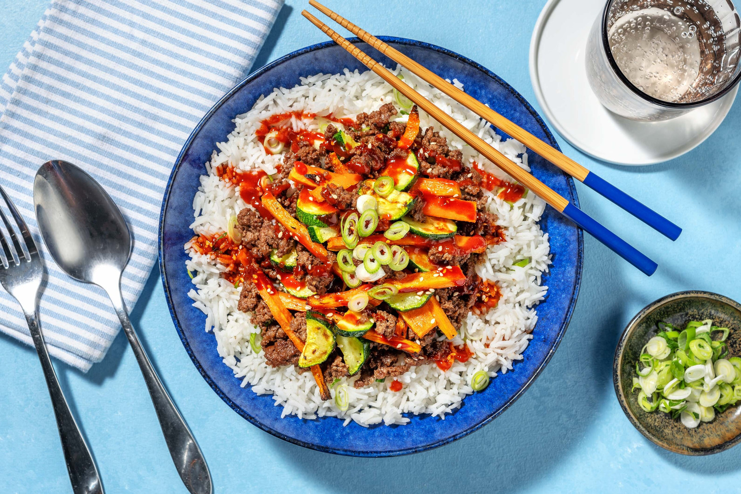 Spicy Bibimbap-Style Impossible® Burger Patties and Chicken Rice Bowls
