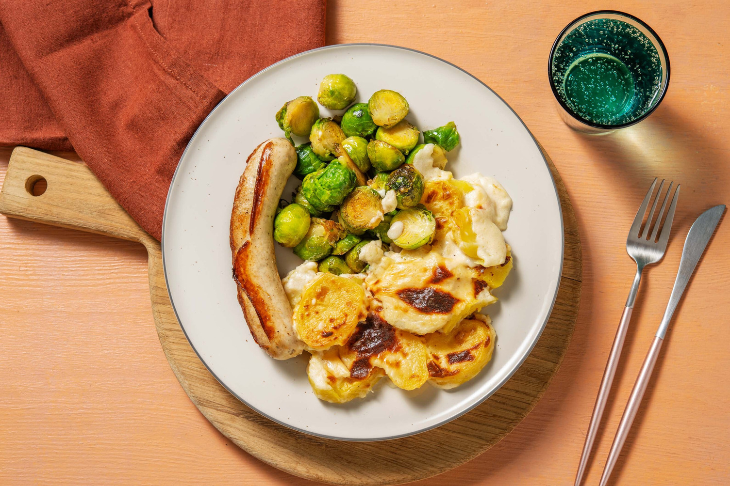 Witte worst met aardappelgratin