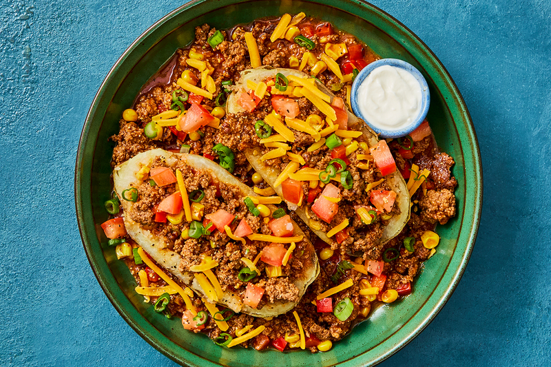 SuperQuick Cheesy Turkey Chili Stuffed Potatoes