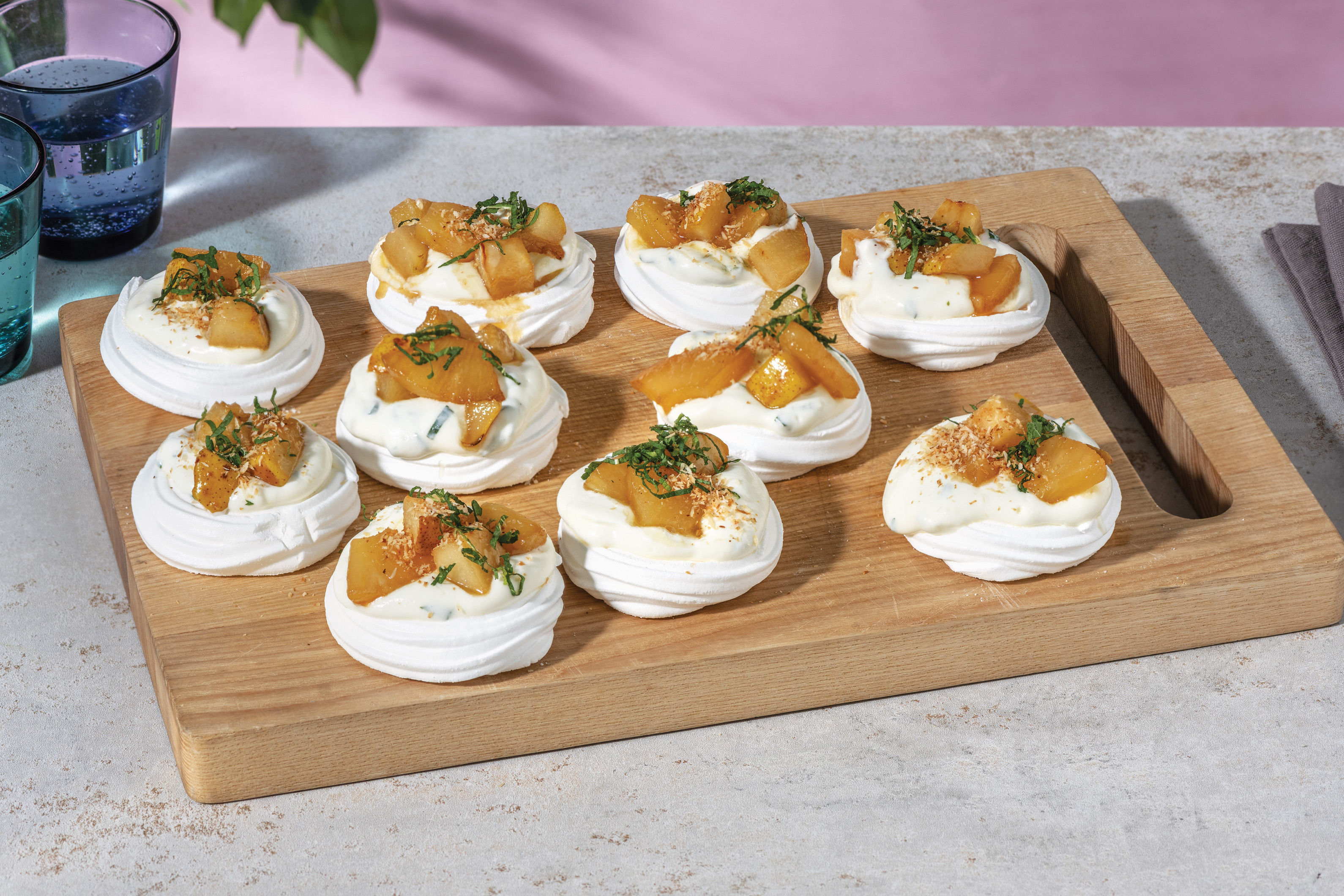 Caramelised Pineapple & Pear Pavlovas with Mint Cream & Toasted Coconut
