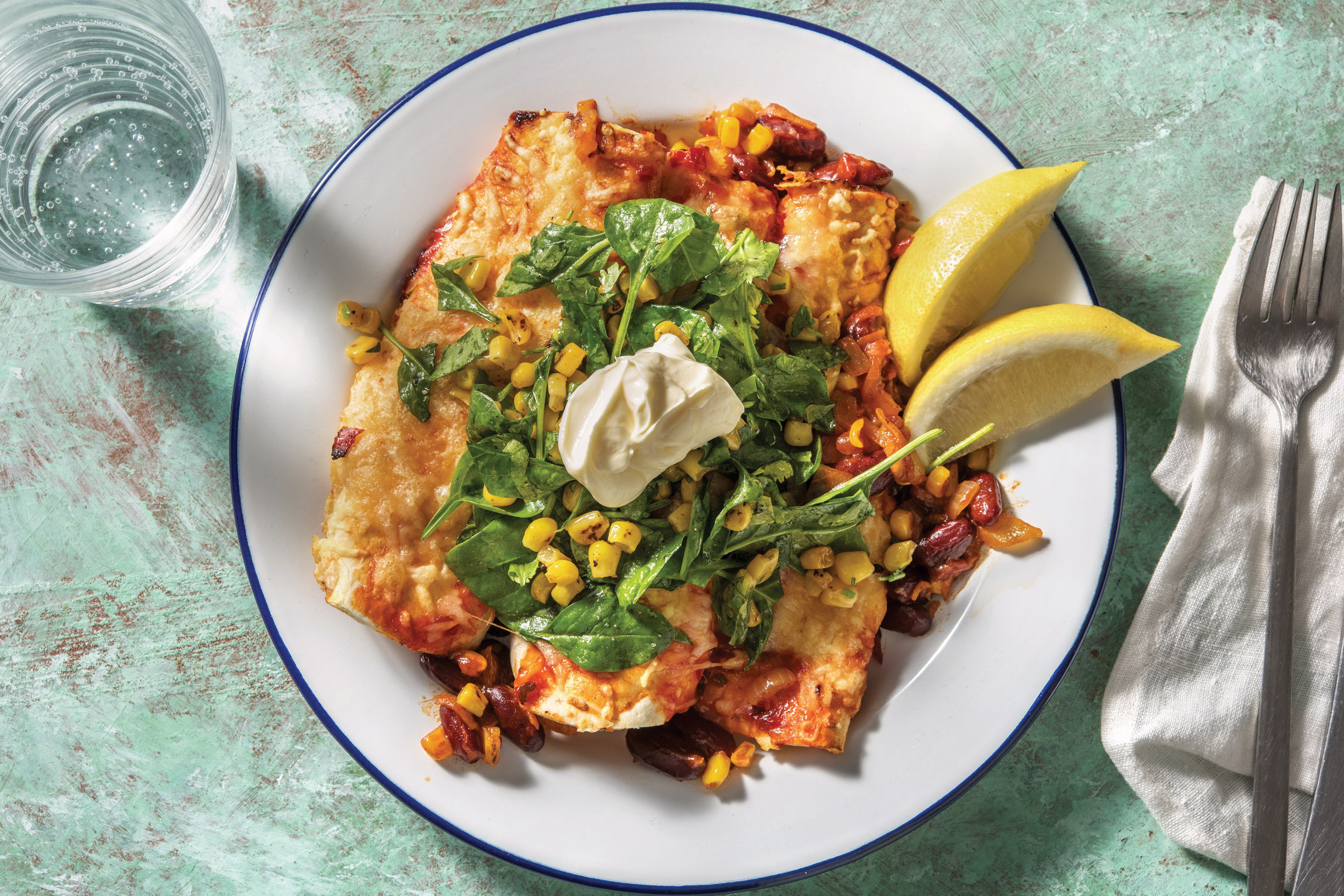 Cheesy Mexican Bean Enchiladas