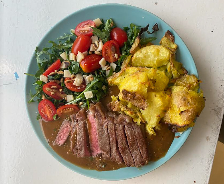 Seared steak with thyme and red wine jus sauce