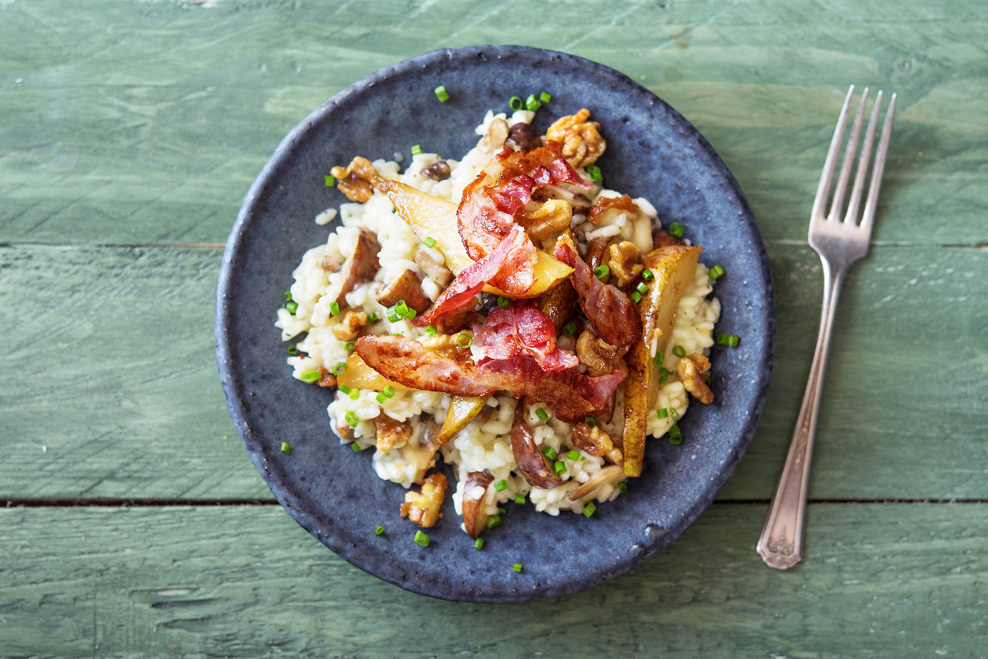 Cremiges Pilzrisotto mit knusprigem Bacon,
