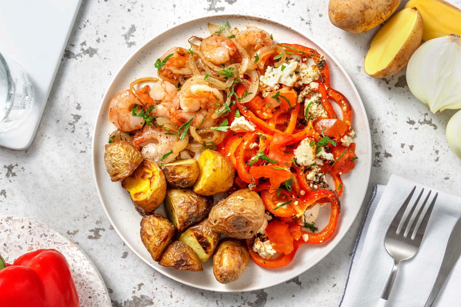 Crevettes à l’ail, légumes et feta au four